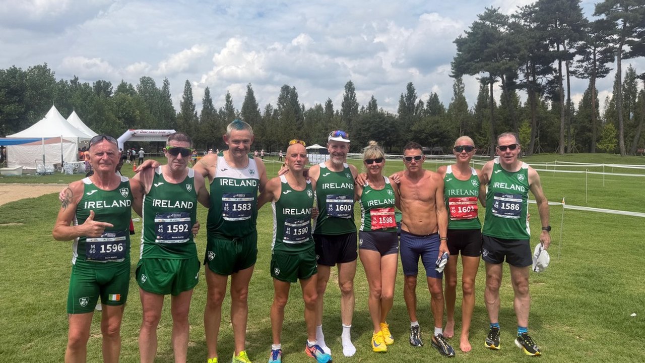 The Irish cross-country team of nine in Ireland vests at Daegu
